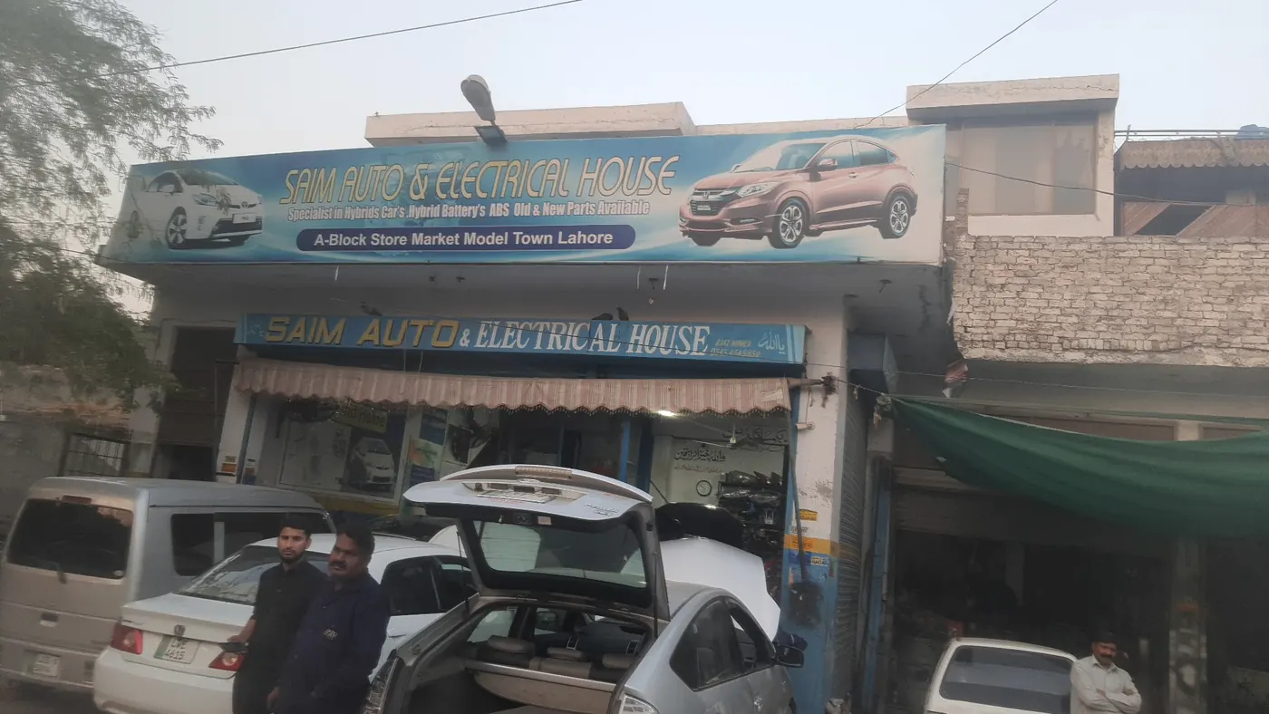 The Saim Autos shopfront in A Block Store Market, Model Town
